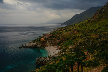Riserva Naturale Orientata dello Zingaro at the sunset on a cloudy day, San Vito Lo Capo, Sicily,...