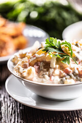 Traditional potato salad with vegetables and mayonnaise