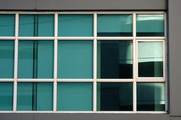 green windows on a building