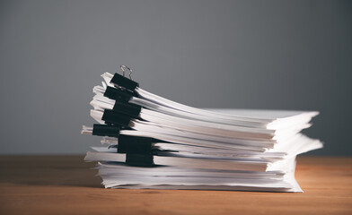 stack of papers on the table