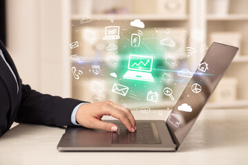 Businessman working on laptop with new business concept