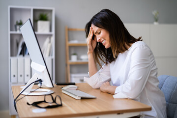 Stressful Business Woman Working On Computer