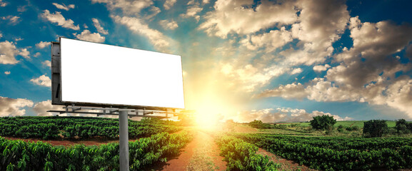 Blank Empty billboard mockup with white screen against clouds and blue sky background. Copy space...