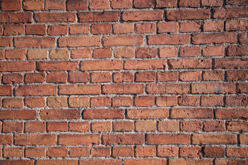 Brick wall of a water tower from 1872 on the island Skeppsholmen in Stockholm a color full autumn day