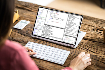 Naklejka premium Programmer Or Coder At Office Desk