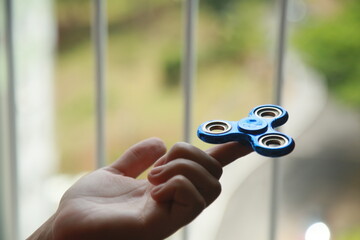 salvador, bahia, brazil - october 23, 2021: Spiner toy is seen in Salvador city.