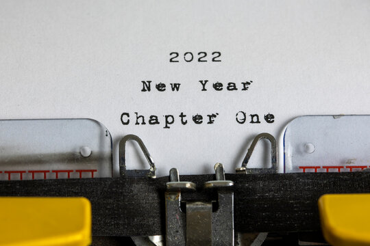 Old typewriter with text 2022 New Year Chapter One	