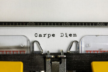 Carpe Diem written on an old typewriter
