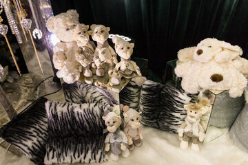 Close up of Christmas decorations with plush toys in brown and white colors