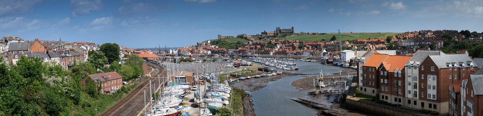 panoramic view of Whitby harbour in summer