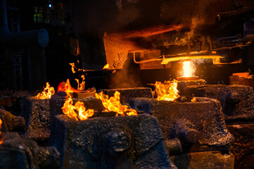 Casting liquid steel into molds. Steel plant