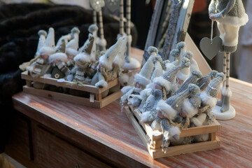 Gnomes in gray knitted hats for sale before christmas