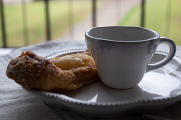 An Apple pie with a cup of coffee for tea time or coffee break