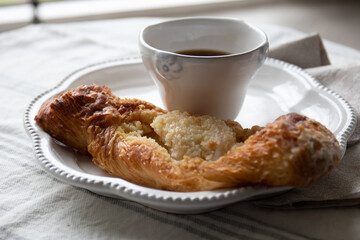 An Apple pie with a cup of coffee for tea time or coffee break