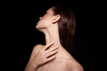 beautiful woman emotions gesture hands bare shoulders dark background