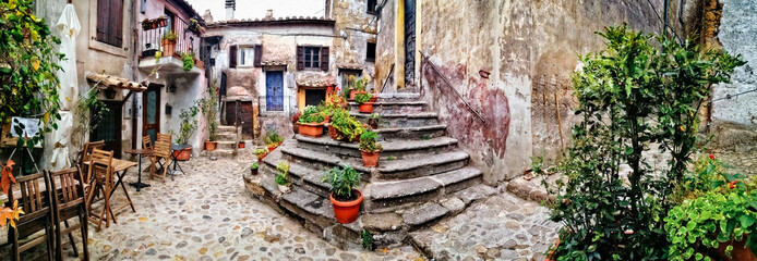 Most beautiful medieval villages of Italy - Calcata with charming floral narrow streets