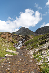 Obraz premium Vals, Switzerland, August 21, 2021 Little waterfall in the alps