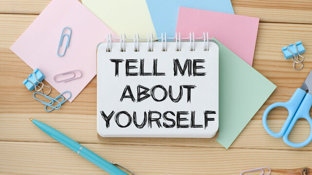 Tell Me About Yourself written on note and marker pen. Interview questions.