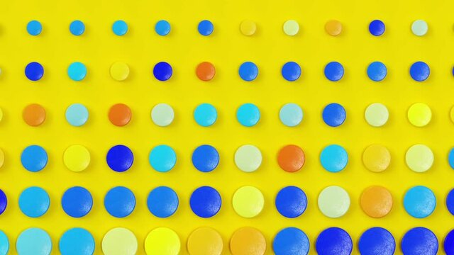 Moving colorful circles on yellow background, trendy minimal 3d looping animation, creative geometric pattern with round shapes, surreal bright hot summer modern seamless backdrop