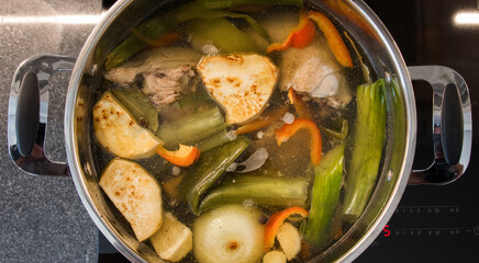 Chicken broth soup with vegetables, tasty broth, very good meal, healthy and very tasty food