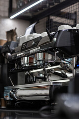 Close up of traditional Espresso Coffee Machine. Flowing fresh ground coffee. Drinking roasted black coffee in the morning.