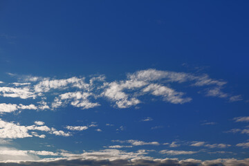 Naklejka na ściany i meble Pure blue sky with cirrus white clouds 