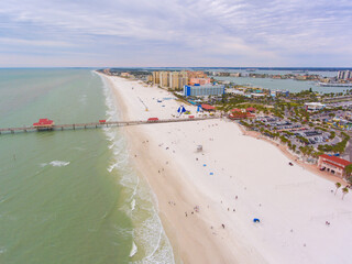 Clearwater Beach and Pier 60 Fishing Pier aerial view in a cloudy day, city of Clearwater, Florida FL, USA.  - obrazy, fototapety, plakaty