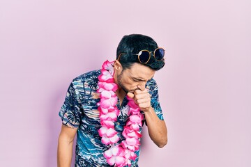 Young hispanic man wearing summer style feeling unwell and coughing as symptom for cold or...
