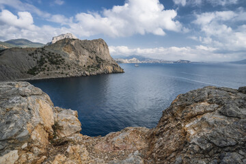 Summer Crimean landscape. Golitsyn trail at rocky Black Sea coast at sunny day, Novyi Svit, Sudak Municipality, Crimea