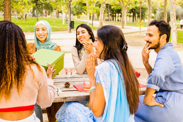 Christmas gift surprise box for new year celebration. Lifestyle multiehtnic group