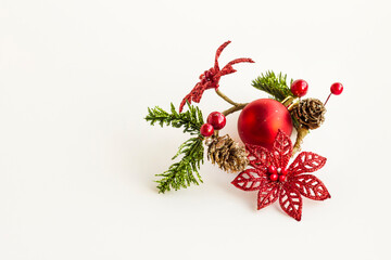 Shiny, colorful christmas decoration ornament on white background with copy space
