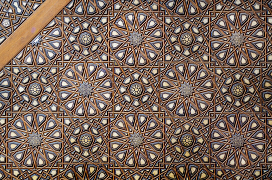 Wooden arabesque decorations tongue and groove assembled, inlaid with ivory and ebony, on Minbar of historic public Mosque of Al Rifai, Old Cairo, Egypt