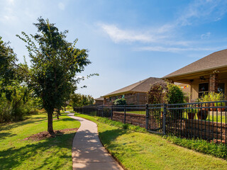 Sunny view of a beautiful community trail and envirnoment, trail