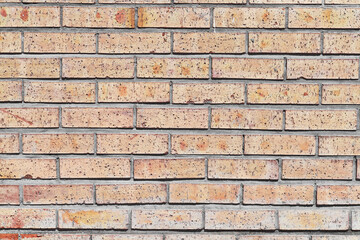 Fototapeta premium Brick wall texture with cracked tiles and cement. Classic brickwall surface background