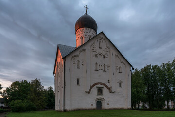View of the Church of the Transfiguration on Ilina Street in the early summer morning in the rays of the rising sun, Veliky Novgorod, Russia