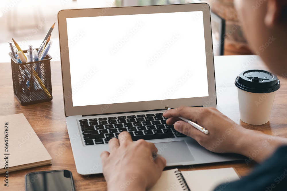 Poster mockup copy space computer notebook laptop concept , a man's hand using a laptop on internet website