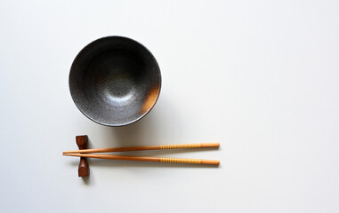 chopsticks and Bowl top view on table,Flat lay,Copy space