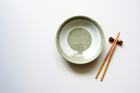 wood chopsticks and dish table background