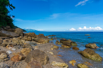 Fototapeta na wymiar Tropical beach view in Puerto Galera, Mindoro Island, Philippines. Travel and landscapes.