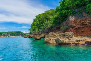 Naklejka na ściany i meble Tropical island view in Puerto Galera, Mindoro Island, Philippines. Travel and landscapes.