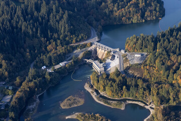 Aerial view from airplane of a water dam by Hayward Lake. Taken near Mission, East of Vancouver, British Columbia, Canada.