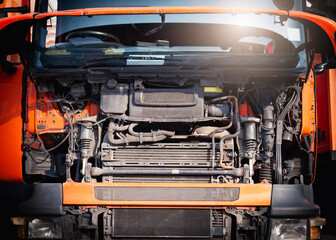 Front of Semi Truck Engine Open Hood. Diesel Engine. Truck Inspection and Maintenance Servicing. 
