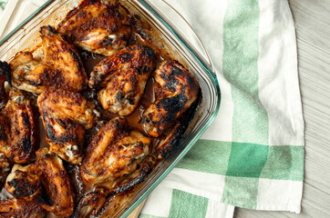 Chicken wings in the oven. Chicken wings with soy sauce and garlic. Glazed chicken wings.
