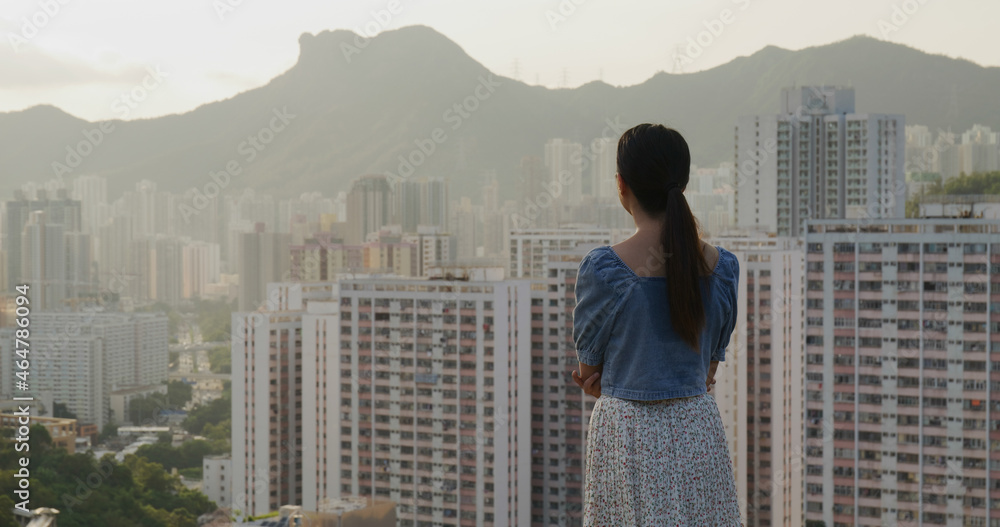 Canvas Prints Woman look at the city in Hong Kong