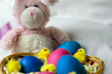 Chickens and Easter pink bunny with a basket of eggs. Easter card concept.