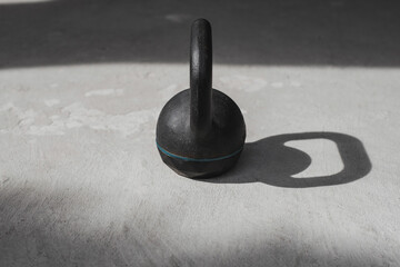 Kettlebell on gym floor. kettlebell weight, gym equipment.