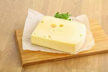 Maasdam cheese over the board