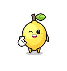 lemon character doing Korean finger heart