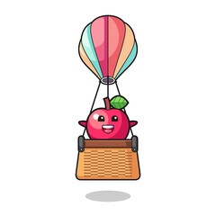 apple mascot riding a hot air balloon
