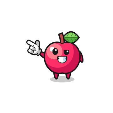 apple mascot pointing top left